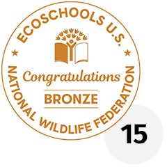 EcoSchools U.S. Bronze Certification seal with the number 15 next to it