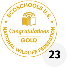 EcoSchools U.S. Gold Certification seal with the number 23 next to it