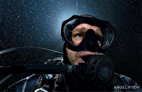 An image of Angel Fitor amidst a cloud of plankton.